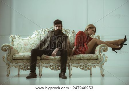 Relationship. Relationship Of Man And Woman Sit Alone On One Sofa. Bad Relatioship Of Cfamily Couple