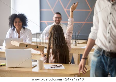 Female Employee Hold Pizza Cardboard Box, Waving To Multiracial Colleagues To Join Corporate Lunch, 