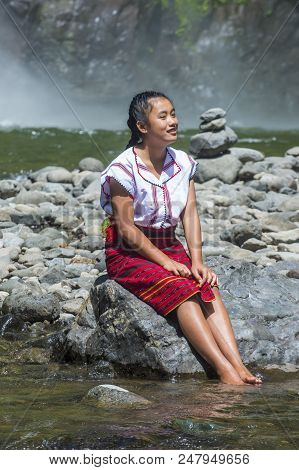 Batad, Philippines - May 02 : Girl From Ifugao Minority Near A Waterfall In Batad The Philippines On