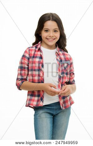 Carefree And Casual. Girl Cute Checkered Shirt And Denim Pants Looks Happy Cheerful. Child Girl Happ
