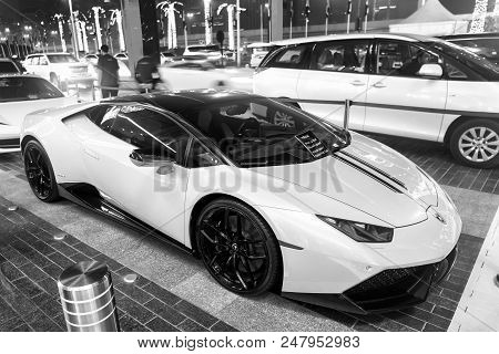 Dubai, Uae - December 23, 2017: Supercar Lamborghini Huricane Greeen Color Parked Next To Dubai Mall