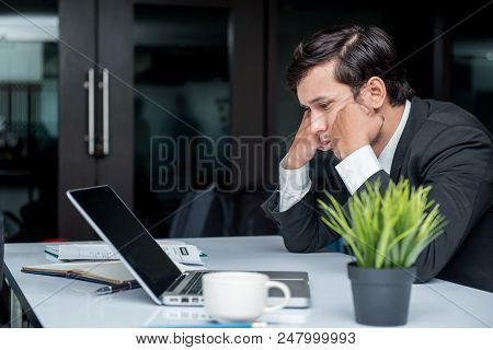 Businessman Working In Office. Pressured And Unsuccessful