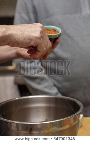 Chef Preparing Ingredients And Teaching How To Make Sushi Mixing Tuna And Seasonings In A Bowl
