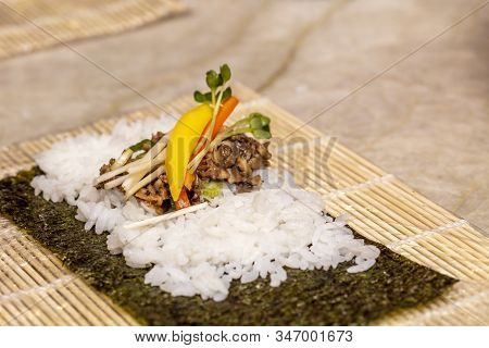Demonstartion On How To Make Sushi Rolls