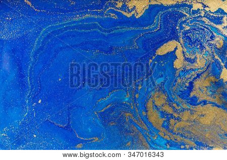Marbled Blue And Gold Abstract Background. Liquid Marble Pattern.
