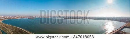 Aerial Panoramic Landscape Photo Of Morii Lake , Bucharest, Romania With Many Buildings In The Dista