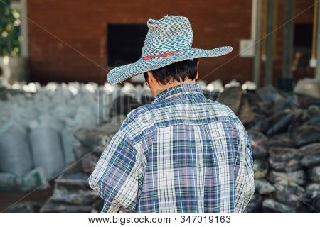Farmer Agriculturist With Organic Fertilizer