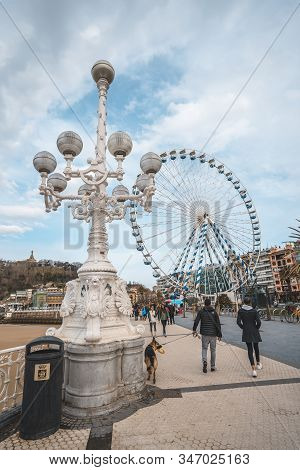 San Sebastian, Gipuzkoa / Spain »; January 25, 2020: One Of The Famous La Concha Lanterns And The Ch