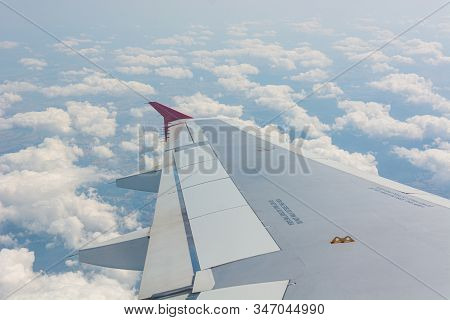 Airplane Wing View From The Passenger Seat.