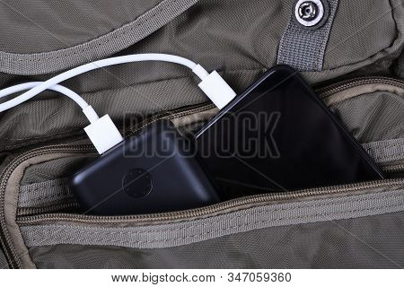 Phone Charging,powerbank Charges Smartphone,cellphone With Energy Bank. Depth Of Field On Power Bank