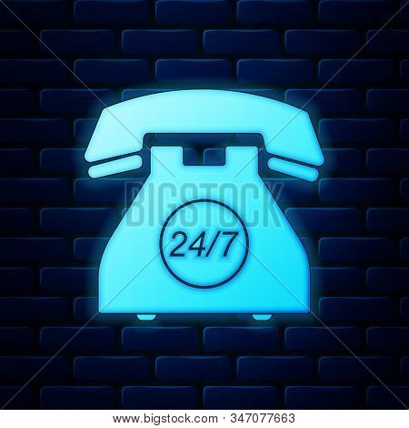 Glowing Neon Telephone 24 Hours Support Icon Isolated On Brick Wall Background. All-day Customer Sup
