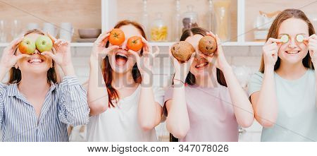 Healthy Lifestyle. Vegetarian Nutrition. Happy Female Friends Having Fun In Kitchen.