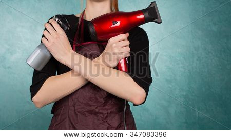 Smiling Girl Hairdresser Holds Fan And Spray In Hands