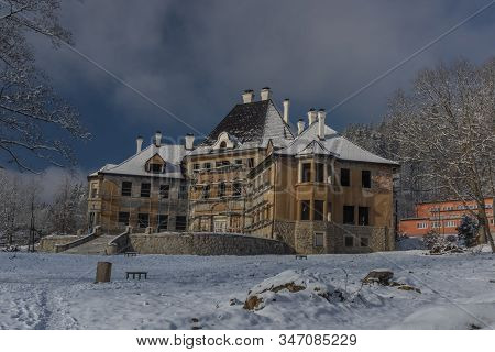 Big House In Reconstruction In Sunny Snowy Day
