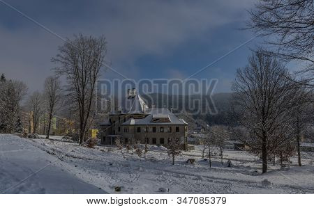 Big House In Reconstruction In Sunny Snowy Day