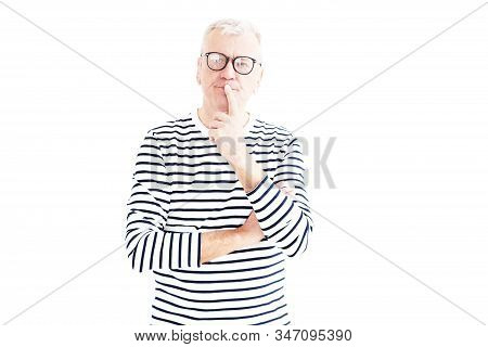 Thinking Elderly Man Studio Portrait With Copy Space