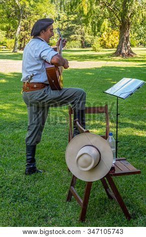 Areco, Argentina - January 22,2018:  A Gaucho Guitarist  At A Traditional Folk Fest In A Country Far
