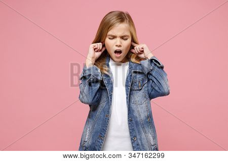 Little Kid Girl 12-13 Years Old In Denim Jacket Isolated On Pastel Pink Background Children Portrait