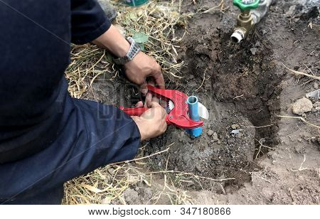 Plumber Worker Install And Repair The Pipe And Fitting Of Water Supply And Underground System Mainte