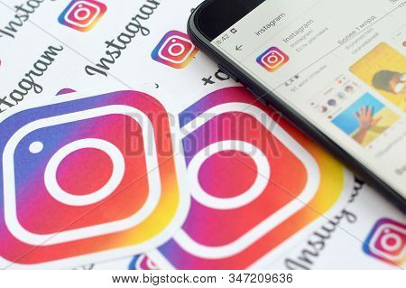 Instagram App On Samsung Smartphone Screen On Banner With Small Instagram Logos. Instagram Is Americ