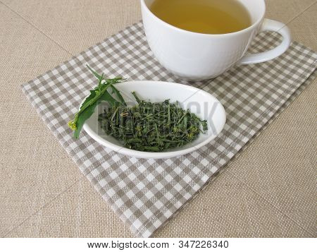 A Cup Of Tea With Dried Hedge Mustard