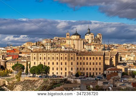 Toledo, Spain. Old City With Its Alcazar, Royal Palace Over The Tagus River Sinuosity. Spain, Europe