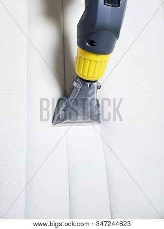 Dry Cleaning Of The White Mattress On The Bed. Wet Cleaning.