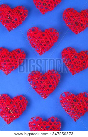 Beautiful Pattern Of The Red Hearts On The Cornflowerblue Background. St Valentines Concept For Your