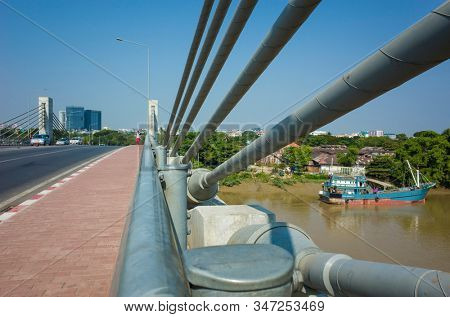Yangon, Myanmar - December 31, 2019: New Thaketa Bridge over Pazundaung Greek