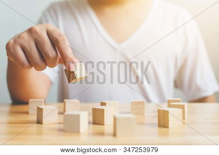 Brain Therapy Rehabilitation Cognitive Psychological Testing. Hand Holding Wood Block Cube Therapy E