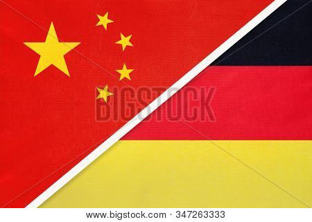 China Or Prc Vs Germany National Flag From Textile. Relationship Between Asian And European Countrie