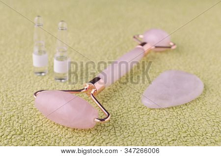 Rose Quartz Facial Roller, Massage Stone And Face Serum In Ampoules