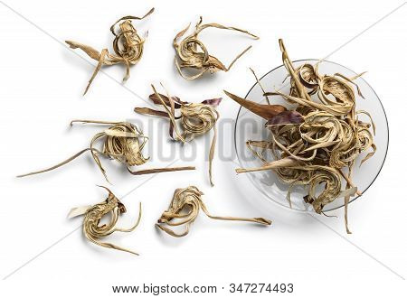 Dry Artichoke Flowers On A White Background. The View From The Top