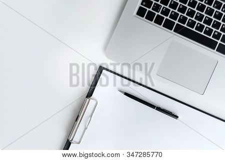 Business Tools Like Notebok, Pen And Tablet On A White Wooden Background. Flat Lay Compositions, Spa