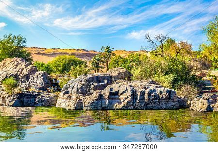 Rocks In The Desrt Of Aswan On River Nile At Sunset, Egypt