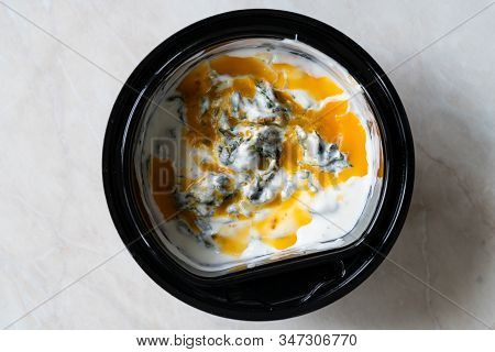 Take Away Healthy Turkish Food Spinach Borani With Yogurt / Yogurt And Red Oil Sauce.