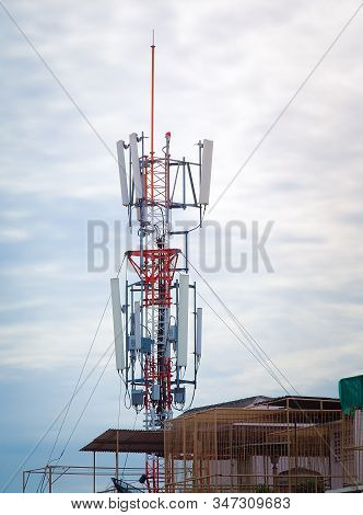 Lte, Gsm, 2g, 3g, 4g, 5g Tower Of Cellular Communication. Telecommunication Tower Against The Blue S