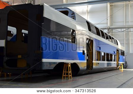 Inside Of The Rail Car Assembly Plant. Industrial Workshop For The Production Of High Speed Trains. 