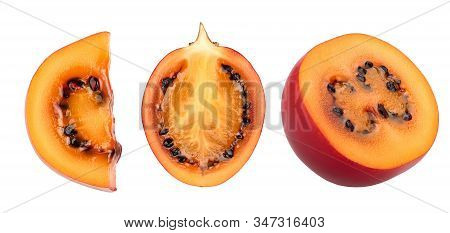 Fresh Tamarillo Fruit Slices With Leaves Isolated On White Background. Top View. Flat Lay. Set Or Co