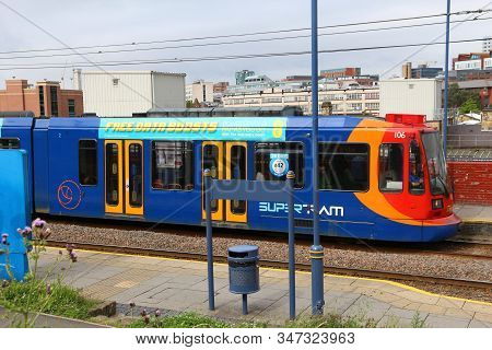 Sheffield, Uk - July 10, 2016: People Ride Stagecoach Supertram In Sheffield, Yorkshire, Uk. Sheffie