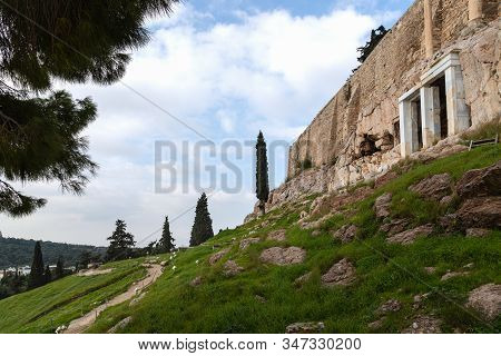 Choregic Monument Of Trasil. In The Upper Part Of The Theater Of Dionysus, There Is A Small Grotto, 