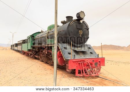 Steam Locomotive And Train Wagons At Hejaz Railway Station Near Wadi Rum, Jordan