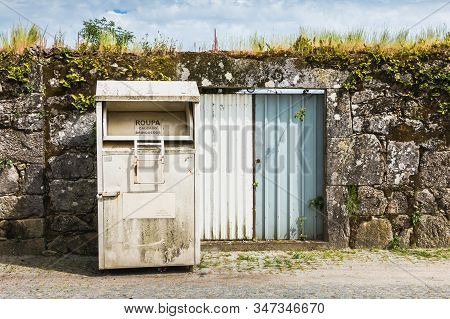 Vila Cha Near Esposende, Portugal - May 9, 2018: Public Containers For Retrieving Toy And Clothes (r