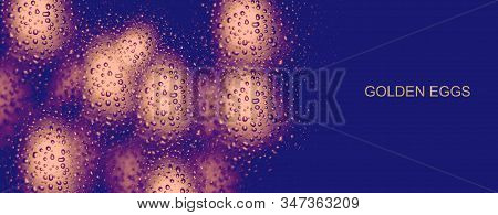 Golden Eggs In Water Drops On Blue Abstract Background. Golden Eggs In Water Drops On A Blue Abstrac