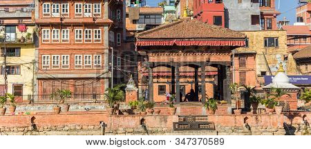 Patan, Nepal - November 15, 2019: Panorama Of Pimbahal Pokhari Krishna Temple And Houses In Patan, N