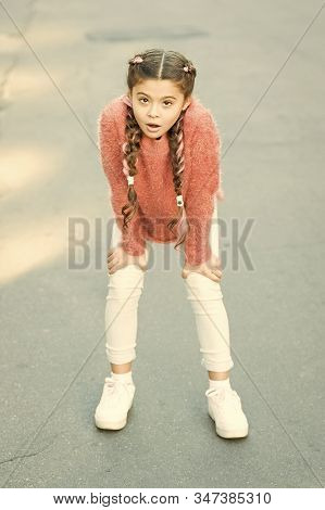 Shes Out Of Breath. Tired Girl. Little Girl Got Tired. Small Girl With Long Brunette Hair. Cute Girl