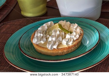 Green Keylime Pie Dessert On A Blue Plate