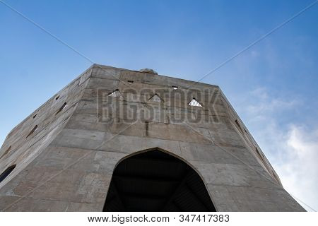 Beautiful Shot Of Historical Memorial Fateh Burj Tower Against Blue Sky In The Background.