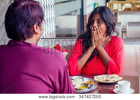 Amased And Surprised Indian Woman Feeling Happy To Get Proposal From Her Boyfriend In Restaurant. I 