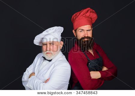 Two Chefs On Kitchen. Chefs In Uniform. Healthy Food. Chief Cook And Professional Culinary. Professi